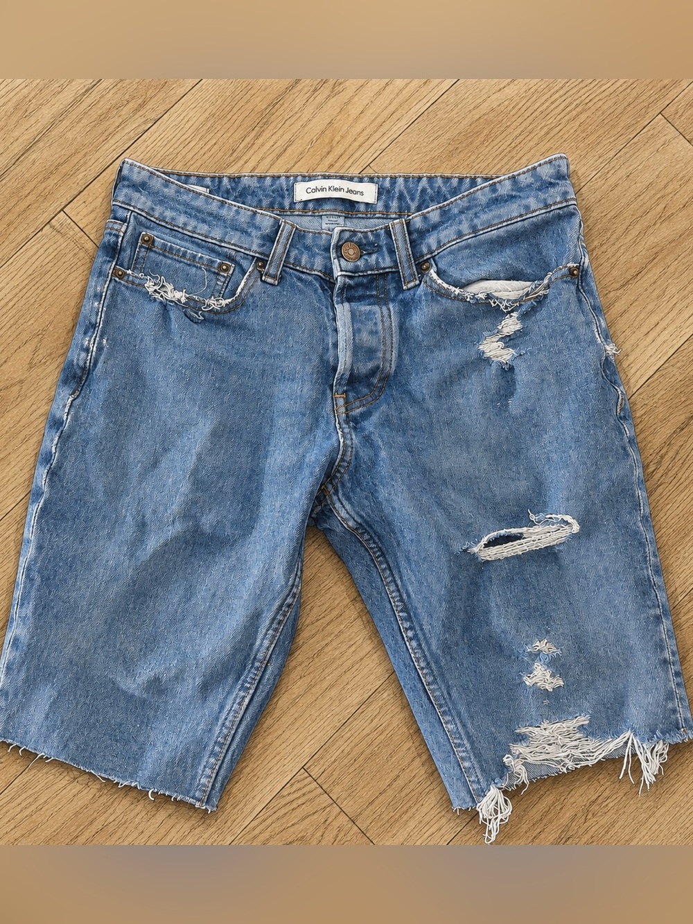 2 Calvin Klein Light Wash Distressed Denim Shorts
